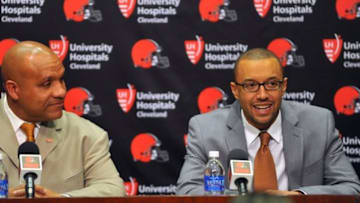 Jan 13, 2016; Berea, OH, USA; Cleveland Browns new head coach Hue Jackson (left) and Vice President of Football Operations Sashi Brown talk during a press conference at the Cleveland Browns training facility. Mandatory Credit: Ken Blaze-USA TODAY Sports