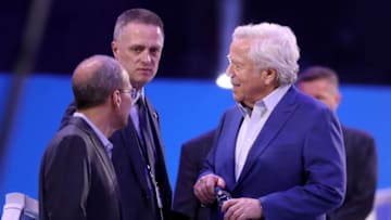 ATLANTA, GEORGIA - JANUARY 28: Owner Robert Kraft talks with team president Jonathan Kraft and director of player personnel Nick Caserio during Super Bowl LIII Opening Night at State Farm Arena on January 28, 2019 in Atlanta, Georgia. (Photo by Rob Carr/Getty Images)