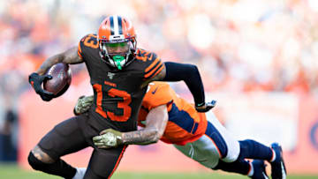 DENVER, CO - NOVEMBER 3: Odell Beckham Jr. #13 of the Cleveland Browns runs the ball after catching a pass and is tackled by Todd Davis #51 of the Denver Broncos during the first half at Broncos Stadium at Mile High on November 3, 2019 in Denver, Colorado. (Photo by Wesley Hitt/Getty Images)