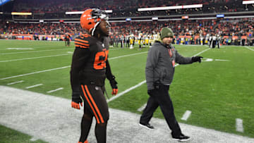 CLEVELAND, OH - NOVEMBER 14: Larry Ogunjobi #65 of the Cleveland Browns is escorted to the locker room after being ejected from the game following a fight between the Browns and the Pittsburgh Steelers near the end of the game at FirstEnergy Stadium on November 14, 2019 in Cleveland, Ohio. Cleveland defeated Pittsburgh 21-7. (Photo by Jamie Sabau/Getty Images)