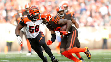 CLEVELAND, OH - DECEMBER 8: Jarvis Landry #80 of the Cleveland Browns attempts to run the ball past Carl Lawson #58 of the Cincinnati Bengals during the first quarter at FirstEnergy Stadium on December 8, 2019 in Cleveland, Ohio. (Photo by Kirk Irwin/Getty Images)