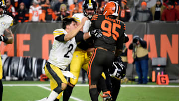 CLEVELAND, OHIO - NOVEMBER 14: Quarterback Mason Rudolph #2 of the Pittsburgh Steelers fights with defensive end Myles Garrett #95 of the Cleveland Browns during the second half at FirstEnergy Stadium on November 14, 2019 in Cleveland, Ohio. The Browns defeated the Steelers 21-7. (Photo by Jason Miller/Getty Images)