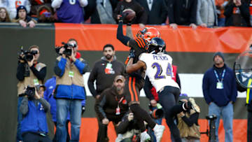 CLEVELAND, OH - DECEMBER 22: Odell Beckham Jr. #13 of the Cleveland Browns catches a pass for a touchdown while being defended by Marcus Peters #24 of the Baltimore Ravens during the fourth quarter at FirstEnergy Stadium on December 22, 2019 in Cleveland, Ohio. Baltimore defeated Cleveland 31-15. (Photo by Kirk Irwin/Getty Images)