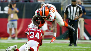GLENDALE, ARIZONA - DECEMBER 15: Running back Kareem Hunt #27 of the Cleveland Browns is tackled by safety Jalen Thompson #34 of the Arizona Cardinals during the second half of the NFL football game at State Farm Stadium on December 15, 2019 in Glendale, Arizona. (Photo by Ralph Freso/Getty Images)