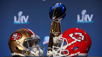 MIAMI, FLORIDA - JANUARY 29: The Vince Lombardi Trophy is displayed with helmets of the San Francisco 49ers and Kansas City Chiefs prior to a press conference with NFL Commissioner Roger Goodell for Super Bowl LIV at the Hilton Miami Downtown on January 29, 2020 in Miami, Florida. The 49ers will face the Chiefs in the 54th playing of the Super Bowl, Sunday February 2nd. (Photo by Cliff Hawkins/Getty Images)