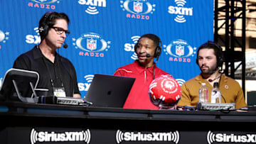 MIAMI, FLORIDA - JANUARY 31: (L-R) SiriusXM host Ed McCaffrey, Special Olympics ambassador and NFL quarterback Baker Mayfield of the Cleveland Browns speak onstage during day 3 of SiriusXM at Super Bowl LIV on January 31, 2020 in Miami, Florida. (Photo by Cindy Ord/Getty Images for SiriusXM )