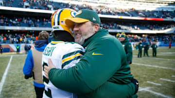 CHICAGO, IL - DECEMBER 18: Kicker Mason Crosby #2 of the Green Bay Packers hugs quarterbacks coach Alex Van Pelt after winning the game at Soldier Field on December 18, 2016 in Chicago, Illinois. The Green Bay Packers defeated the Chicago Bears 30-27. (Photo by Joe Robbins/Getty Images)