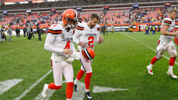 CLEVELAND, OH - SEPTEMBER 09: Britton Colquitt #4 and Zane Gonzalez #2 of the Cleveland Browns walk off the field after a 21-21 tie against the Pittsburgh Steelers at FirstEnergy Stadium on September 9, 2018 in Cleveland, Ohio. (Photo by Joe Robbins/Getty Images)