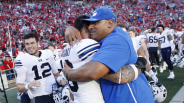 MADISON, WI - SEPTEMBER 15: Head coach Kalani Sitake of the BYU Cougars celebrates with Sione Takitaki #16 after the game against the Wisconsin Badgers at Camp Randall Stadium on September 15, 2018 in Madison, Wisconsin. BYU won 24-21. (Photo by Joe Robbins/Getty Images)
