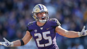 SEATTLE, WA - OCTOBER 20: Linebacker Ben Burr-Kirven #25 of the Washington Huskies reacts after making an interception in the fourth quarter against the Colorado Buffaloes at Husky Stadium on October 20, 2018 in Seattle, Washington. (Photo by Otto Greule Jr/Getty Images)