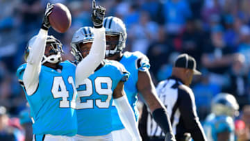 CHARLOTTE, NC - OCTOBER 28: Captain Munnerlyn #41 of the Carolina Panthers celebrates with teammates after intercepting a pass during their game against the Baltimore Ravens at Bank of America Stadium on October 28, 2018 in Charlotte, North Carolina. (Photo by Grant Halverson/Getty Images)