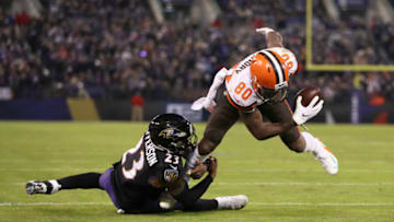 BALTIMORE, MARYLAND - DECEMBER 30: Wide Receiver Jarvis Landry #80 of the Cleveland Browns is tackled by strong safety Tony Jefferson #23 of the Baltimore Ravens in the fourth quarter at M&T Bank Stadium on December 30, 2018 in Baltimore, Maryland. (Photo by Patrick Smith/Getty Images)