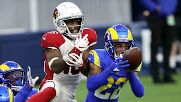 INGLEWOOD, CALIFORNIA - JANUARY 03: Troy Hill #22 of the Los Angeles Rams breaks up a pass intended for Trent Sherfield #16 of the Arizona Cardinals during the fourth quarter at SoFi Stadium on January 03, 2021 in Inglewood, California. (Photo by Sean M. Haffey/Getty Images)
