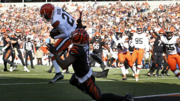 CINCINNATI, OHIO - NOVEMBER 07: Denzel Ward #21 of the Cleveland Browns intercepts the ball thrown by Joe Burrow #9 of the Cincinnati Bengals and returns it for a touchdown during the first quarter at Paul Brown Stadium on November 07, 2021 in Cincinnati, Ohio. (Photo by Kirk Irwin/Getty Images)