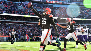 CLEVELAND, OHIO - DECEMBER 12: Myles Garrett #95 of the Cleveland Browns celebrates after running the ball in for a touchdown after a fumble recovery in the second quarter against the Baltimore Ravens at FirstEnergy Stadium on December 12, 2021 in Cleveland, Ohio. (Photo by Jason Miller/Getty Images)