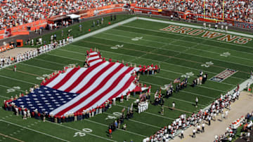 CLEVELAND - SEPTEMBER 11: A flag is unveiled in tribute to the victims of 9/11 and Hurricane Katrina before the opening game between the Cleveland Browns and the Cincinnati Bengals during the first quarter at Cleveland Browns Stadium on September 11, 2005 in Cleveland, Ohio. (Photo by Harry How/Getty Images)