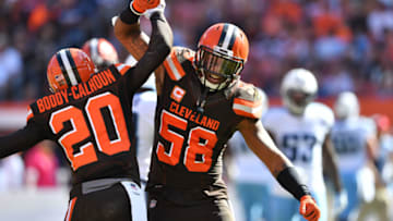 CLEVELAND, OH - OCTOBER 22: Briean Boddy-Calhoun #20 and Christian Kirksey #58 of the Cleveland Browns celebrate after making a third down stop in the first quarter against the Tennessee Titans at FirstEnergy Stadium on October 22, 2017 in Cleveland, Ohio. (Photo by Jason Miller/Getty Images)