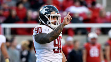 SALT LAKE CITY, UT - NOVEMBER 11: Daniel Ekuale #90 of the Washington State Cougars gestures after a first half stop against the Utah Utes at Rice-Eccles Stadium on November 11, 2017 in Salt Lake City, Utah. (Photo by Gene Sweeney Jr/Getty Images)