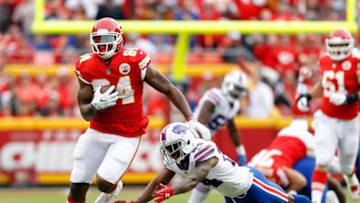 KANSAS CITY, MO - NOVEMBER 26: Tight end Demetrius Harris #84 of the Kansas City Chiefs carries the ball after making a catch as defensive back Leonard Johnson #24 of the Buffalo Bills defends during the game at Arrowhead Stadium on November 26, 2017 in Kansas City, Missouri. (Photo by Jamie Squire/Getty Images)