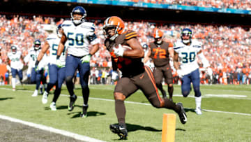 CLEVELAND, OH - OCTOBER 13: Nick Chubb #24 of the Cleveland Browns beats K.J. Wright #50 of the Seattle Seahawks to the end zone to score a touchdown during the first quarter at FirstEnergy Stadium on October 13, 2019 in Cleveland, Ohio. (Photo by Kirk Irwin/Getty Images)
