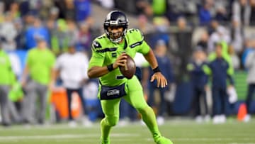 SEATTLE, WASHINGTON - OCTOBER 03: Russell Wilson #3 of the Seattle Seahawks scrambles out of the pocket during the game against the Los Angeles Rams at CenturyLink Field on October 03, 2019 in Seattle, Washington. The Seattle Seahawks top the Los Angeles Rams 30-29. (Photo by Alika Jenner/Getty Images)