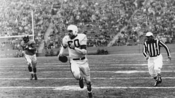 Cleveland Browns Hall of Fame quarterback Otto Graham on a run in a 24-17 loss to the Los Angeles Rams in a League Championship game on December 23, 1951 at Los Angeles Memorial Coliseum in Los Angeles, California. (Photo by Vic Stein/Getty Images) *** Local Caption ***