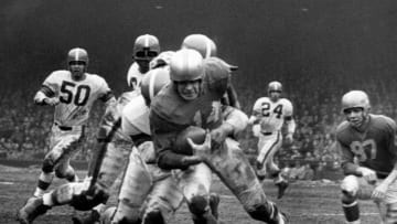 Detroit Lions back Bob Hoernschemeyer on a carry in a 17-16 win over the Cleveland Browns in a League Championship game on December 27, 1953 at Briggs Stadium in Detroit, Michigan. (Photo by George Gelatly/Getty Images) *** Local Caption ***