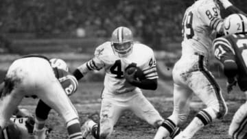 Cleveland Browns Hall of Fame running back Leroy Kelly (44) runs through a hole in the defense during the AFC Divisional Playoff, a 20-3 loss to the Baltimore Colts on December 26, 1971, at Cleveland Municipal Stadium in Cleveland, Ohio. (Photo by Tim Culek/Getty Images)