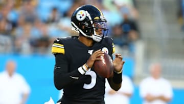 Aug 29, 2019; Charlotte, NC, USA; Pittsburgh Steelers quarterback Joshua Dobbs (5) looks to pass the ball during the second quarter against the Carolina Panthers at Bank of America Stadium. Mandatory Credit: Jeremy Brevard-USA TODAY Sports