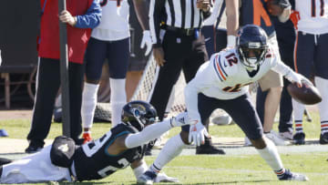 Dec 27, 2020; Jacksonville, Florida, USA; Chicago Bears wide receiver Allen Robinson II (12) is stopped by Jacksonville Jaguars safety Josh Jones (29) during the first quarter at TIAA Bank Field. Mandatory Credit: Reinhold Matay-USA TODAY Sports