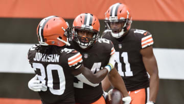Jan 3, 2021; Cleveland, Ohio, USA; Cleveland Browns running back Nick Chubb (24) celebrates with wide receiver Donovan Peoples-Jones (11) and running back D'Ernest Johnson (30) after scoring a touchdown during the first quarter against the Pittsburgh Steelers at FirstEnergy Stadium. Mandatory Credit: Ken Blaze-USA TODAY Sports