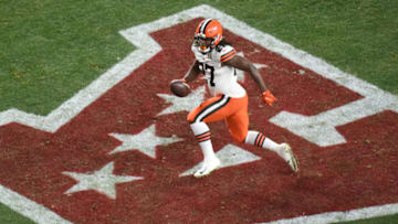 Jan 10, 2021; Pittsburgh, PA, USA; Cleveland Browns running back Kareem Hunt (27) scores a touchdown against the Pittsburgh Steelers in the first half of an AFC Wild Card playoff game at Heinz Field. Mandatory Credit: Philip G. Pavely-USA TODAY Sports