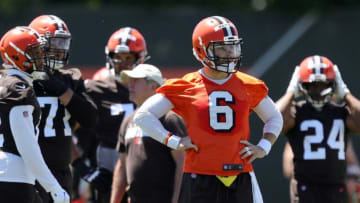 Cleveland Browns quarterback Baker Mayfield (6) listens to a coach during an NFL football practice at the team's training facility, Wednesday, June 16, 2021, in Berea, Ohio.Browns 10