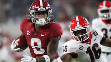 Alabama wide receiver John Metchie III (8) catches a touchdown pass behind Georgia defensive back Lewis Cine (16) during Alabama's 41-24 win over Georgia in Bryant-Denny Stadium Saturday, Oct. 17, 2020. [Staff Photo/Gary Cosby Jr.]Alabama Vs Georgia Sec Football