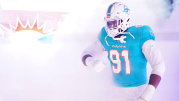 Nov 11, 2021; Miami Gardens, Florida, USA; Miami Dolphins defensive end Emmanuel Ogbah (91) runs onto the field prior to the game against the Baltimore Ravens at Hard Rock Stadium. Mandatory Credit: Jasen Vinlove-USA TODAY Sports