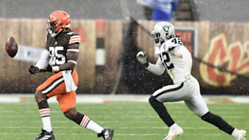Nov 1, 2020; Cleveland, Ohio, USA; Cleveland Browns tight end David Njoku (85) drops a pass as Las Vegas Raiders inside linebacker Cory Littleton (42) defends during the second half at FirstEnergy Stadium. Mandatory Credit: Ken Blaze-USA TODAY Sports