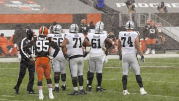 Nov 1, 2020; Cleveland, Ohio, USA; Cleveland Browns defensive end Myles Garrett (95) stands watching the Las Vegas Raiders offense between downs as snow flies during the second quarter at FirstEnergy Stadium. Mandatory Credit: Scott Galvin-USA TODAY Sports