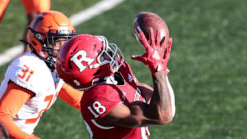 Nov 14, 2020; Piscataway, New Jersey, USA; Rutgers Scarlet Knights wide receiver Bo Melton (18) catches the ball in font of Illinois Fighting Illini defensive back Devon Witherspoon (31) during the first half at SHI Stadium. Mandatory Credit: Vincent Carchietta-USA TODAY Sports