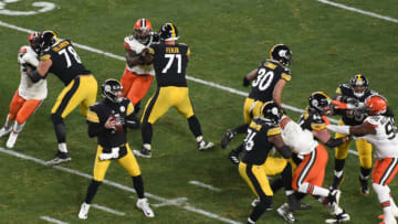 Jan 10, 2021; Pittsburgh, PA, USA; Pittsburgh Steelers quarterback Ben Roethlisberger (7) sets to pass against the Cleveland Browns in the first half of an AFC Wild Card playoff game at Heinz Field. Mandatory Credit: Philip G. Pavely-USA TODAY Sports