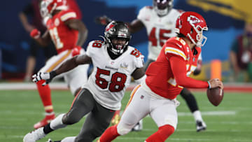 Feb 7, 2021; Tampa, FL, USA; Kansas City Chiefs quarterback Patrick Mahomes (15) is chased by Tampa Bay Buccaneers outside linebacker Shaquil Barrett (58) in the second half during Super Bowl LV at Raymond James Stadium. Mandatory Credit: Matthew Emmons-USA TODAY Sports
