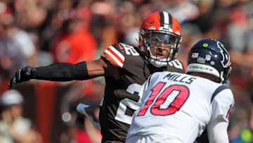 Cleveland Browns safety Grant Delpit (22) wraps up Houston Texans quarterback Davis Mills (10) during the second half of an NFL football game, Sunday, Sept. 19, 2021, in Cleveland, Ohio.Delpit 1