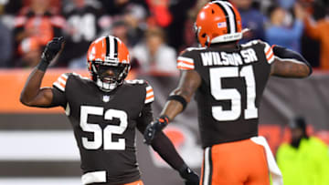 Oct 21, 2021; Cleveland, Ohio, USA; Cleveland Browns outside linebacker Elijah Lee (52) and outside linebacker Mack Wilson (51) celebrate after a tackle during the first half against the Denver Broncos at FirstEnergy Stadium. Mandatory Credit: Ken Blaze-USA TODAY Sports