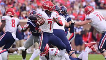 Nov 6, 2021; Oxford, Mississippi, USA; Liberty Flames quarterback Malik Willis (7) looks to pass the ball against the Mississippi Rebels during the second quarter at Vaught-Hemingway Stadium. Mandatory Credit: Matt Bush-USA TODAY Sports