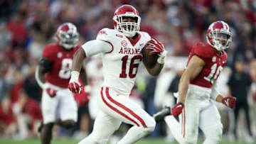 Nov 20, 2021; Tuscaloosa, Alabama, USA; Arkansas Razorbacks wide receiver Treylon Burks (16) runs for a touchdown after making a catch against Alabama Crimson Tide at Bryant-Denny Stadium. Alabama won 42-35. Mandatory Credit: Gary Cosby Jr.-USA TODAY Sports