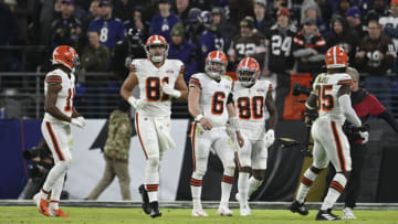Nov 28, 2021; Baltimore, Maryland, USA; Cleveland Browns quarterback Baker Mayfield (6) runs off the field with teammates after a third quarter touchdown pass against the Baltimore Ravens at M&T Bank Stadium. Mandatory Credit: Tommy Gilligan-USA TODAY Sports