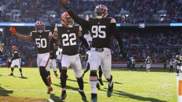 Dec 12, 2021; Cleveland, Ohio, USA; Cleveland Browns defensive end Myles Garrett (95) returns a fumble for a touchdown against the Baltimore Ravens during the second quarter at FirstEnergy Stadium. Mandatory Credit: Scott Galvin-USA TODAY Sports