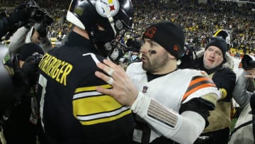 Jan 3, 2022; Pittsburgh, Pennsylvania, USA; Pittsburgh Steelers quarterback Ben Roethlisberger (left) and Cleveland Browns quarterback Baker Mayfield (right) embrace at mid-field after playing at Heinz Field. The Steelers won 26-14. Mandatory Credit: Charles LeClaire-USA TODAY Sports