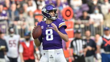 Jan 9, 2022; Minneapolis, Minnesota, USA; Minnesota Vikings quarterback Kirk Cousins (8) prepares to throw a pass against the Chicago Bears during the first quarter at U.S. Bank Stadium. Mandatory Credit: Jeffrey Becker-USA TODAY Sports