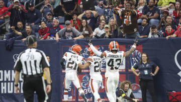Dec 4, 2022; Houston, Texas, USA; Cleveland Browns cornerback Denzel Ward (21) scores a touchdown during the third quarter against the Houston Texans at NRG Stadium. Mandatory Credit: Troy Taormina-USA TODAY Sports