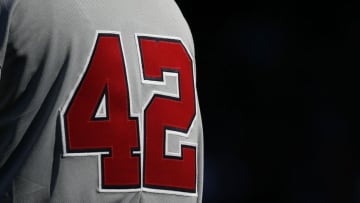 Apr 15, 2015; Boston, MA, USA; Washington Nationals third base coach Bob Henley wears number 42 to honor Jackie Robinson during the seventh inning against the Boston Red Sox at Fenway Park. Mandatory Credit: Greg M. Cooper-USA TODAY Sports